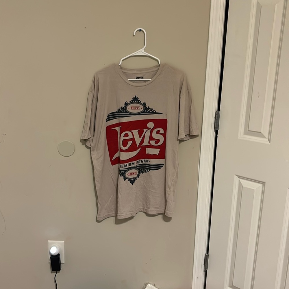 Brand new excellent condition T shirt.